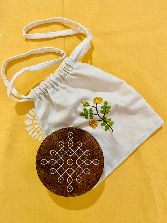 Kolam Wooden Coaster Set (4 pcs) with Potli bag